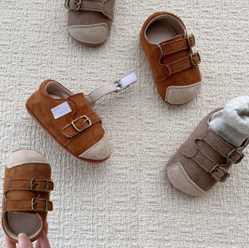 2026 Unisex Baby Soft Sole Learning Shoes for Spring and Autumn Faux Suede Velcro Strap Non Slip Loafers Rounded Toe Baby Walking Shoes Wholesale 2026 Unisex Baby Soft Sole Learning Shoes for Spring and Autumn Faux Suede Velcro Strap Non Slip Loafers Rounded Toe Baby Walking Shoes Wholesale